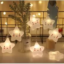 Lampki świąteczne kurtyna Gwiazdki z uśmiechem LED