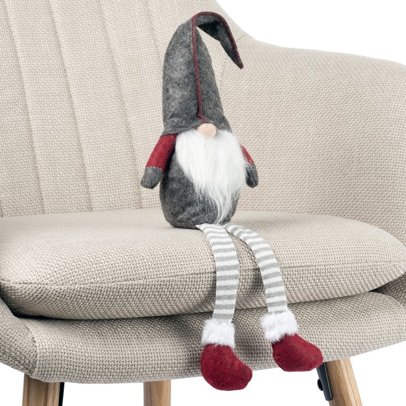 Skrzat świąteczny siedzący z długimi nogami