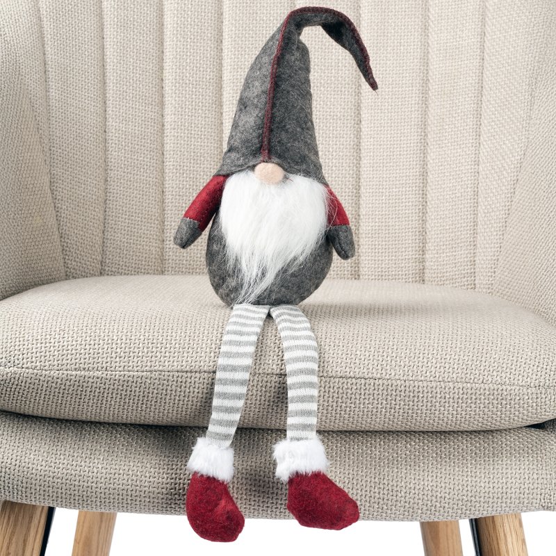 Skrzat świąteczny siedzący z długimi nogami