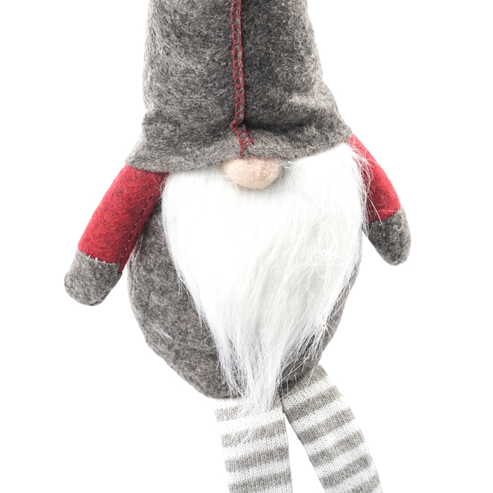 Skrzat świąteczny siedzący gnom z długimi zwisającymi nogami