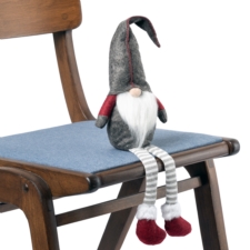 Skrzat świąteczny siedzący gnom z długimi zwisającymi nogami