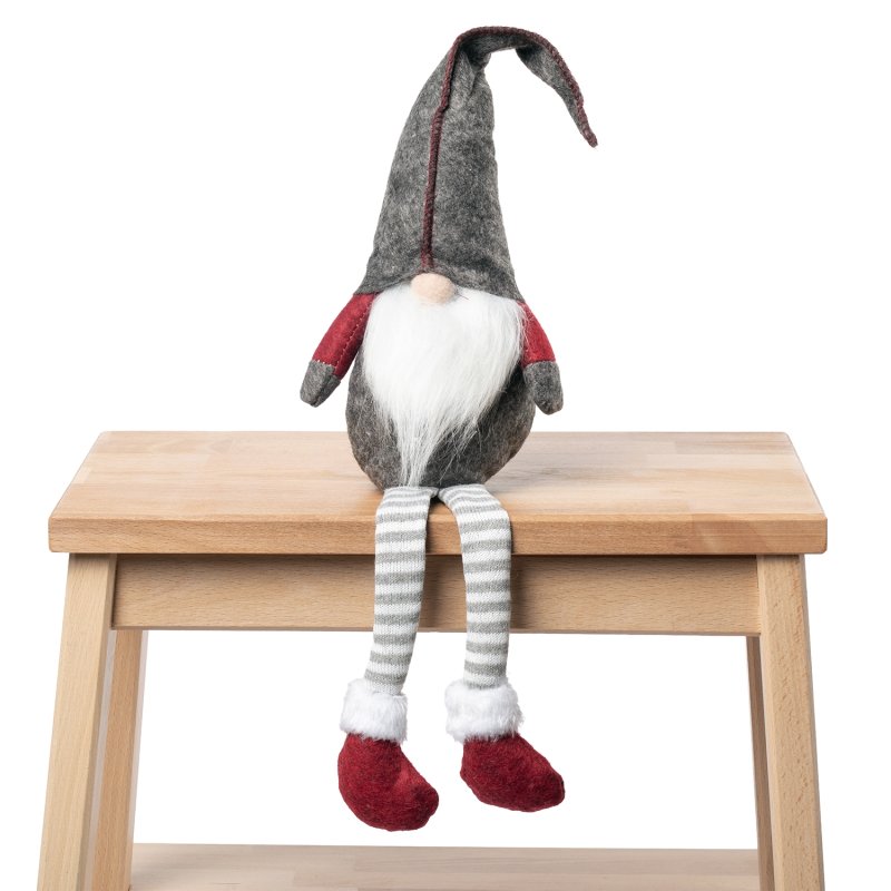 Skrzat świąteczny siedzący z długimi nogami