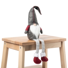 Skrzat świąteczny siedzący gnom z długimi zwisającymi nogami